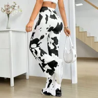 Cow Print High Waist Flare Pants for Women Stretchy Fabric Casual Style Available in Sizes S to XL Wholesale