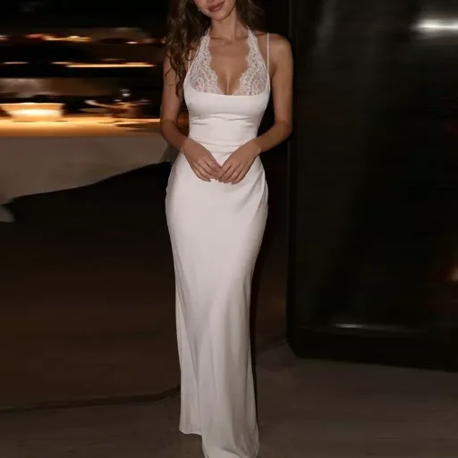 Elegant Sleeveless V Neck Dress in Solid Polyester Available in White and Black Sizes S to 3XL Elegant Sleeveless V Neck Dress in Solid Polyester Available in White and Black Sizes S to 3XL